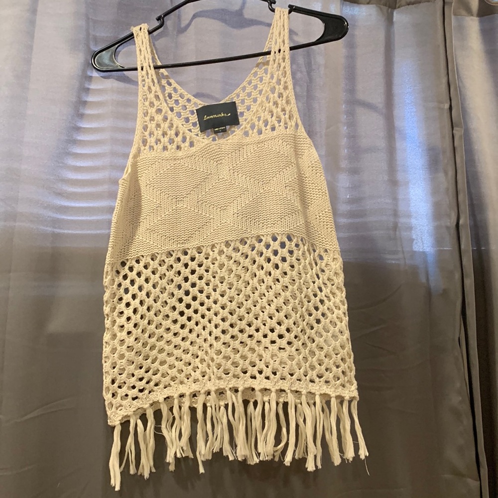 Slightly worn knitted tank top